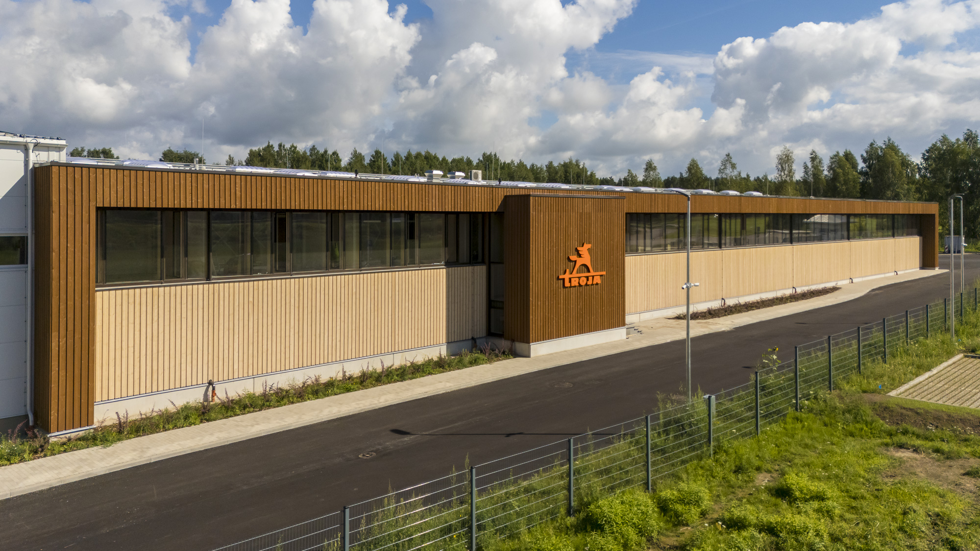 Industrial Facility Facade with CLT and Infill Panels — Latvia